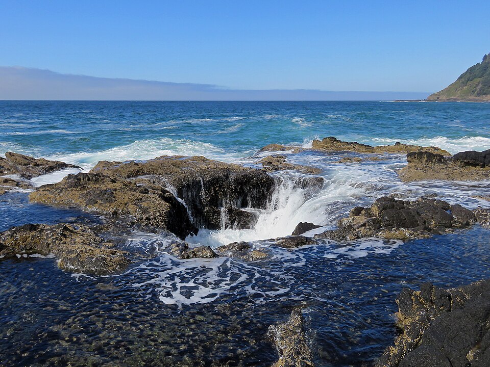 Thor's Well and rocky shoreline at Cape Perpetua on the Oregon coast